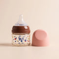 Peach Pink Cap Plastic Baby Feeder